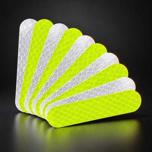 Éventail de bandes adhésives réfléchissantes moto jaune fluo et blanches à surface alvéolée